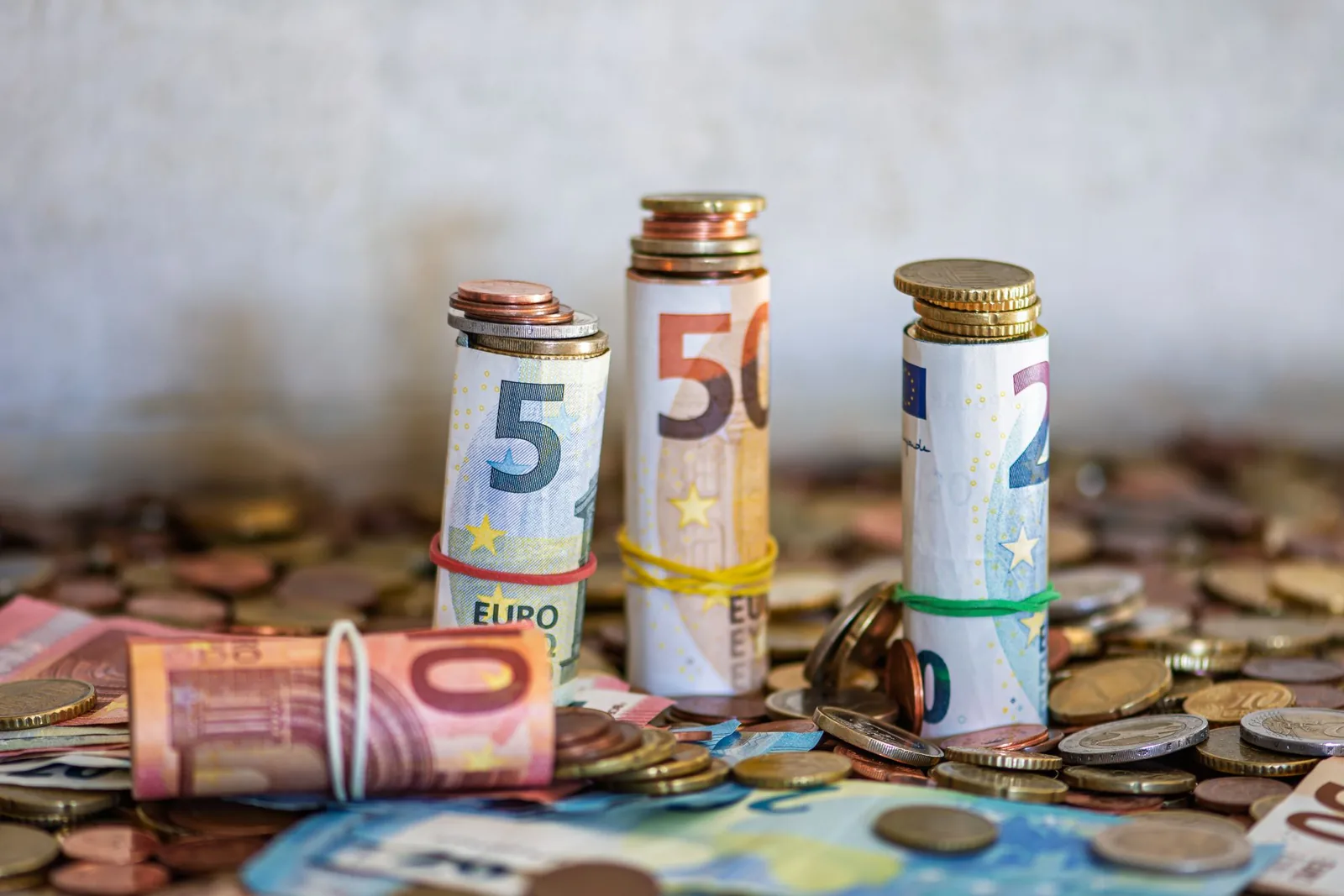Rolos de moedas e moedas de euro para gestão de troco